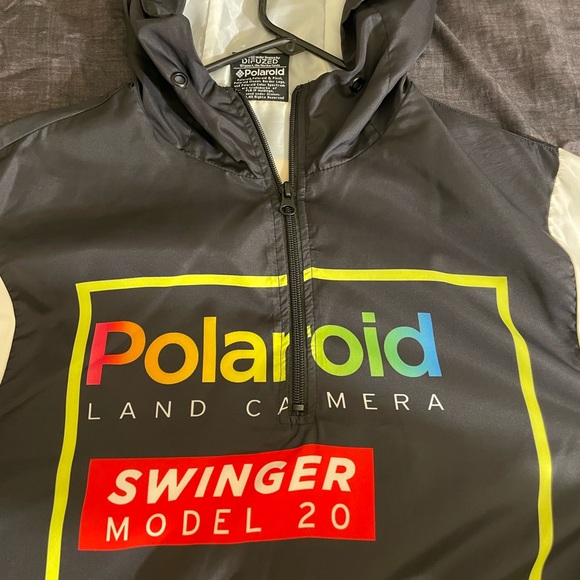 A Polaroid wind-breaker jacket, size medium. It’s black and white. - Picture 2 of 3